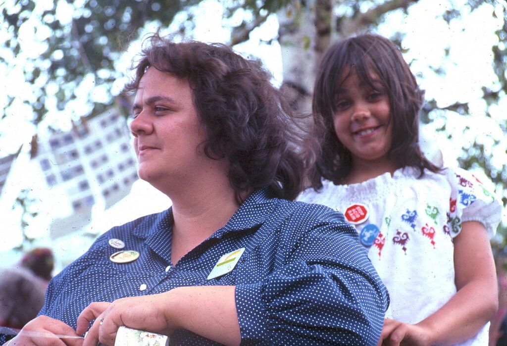 Archival photo of Penny with one of her kids at 1983 Toronto Pride.